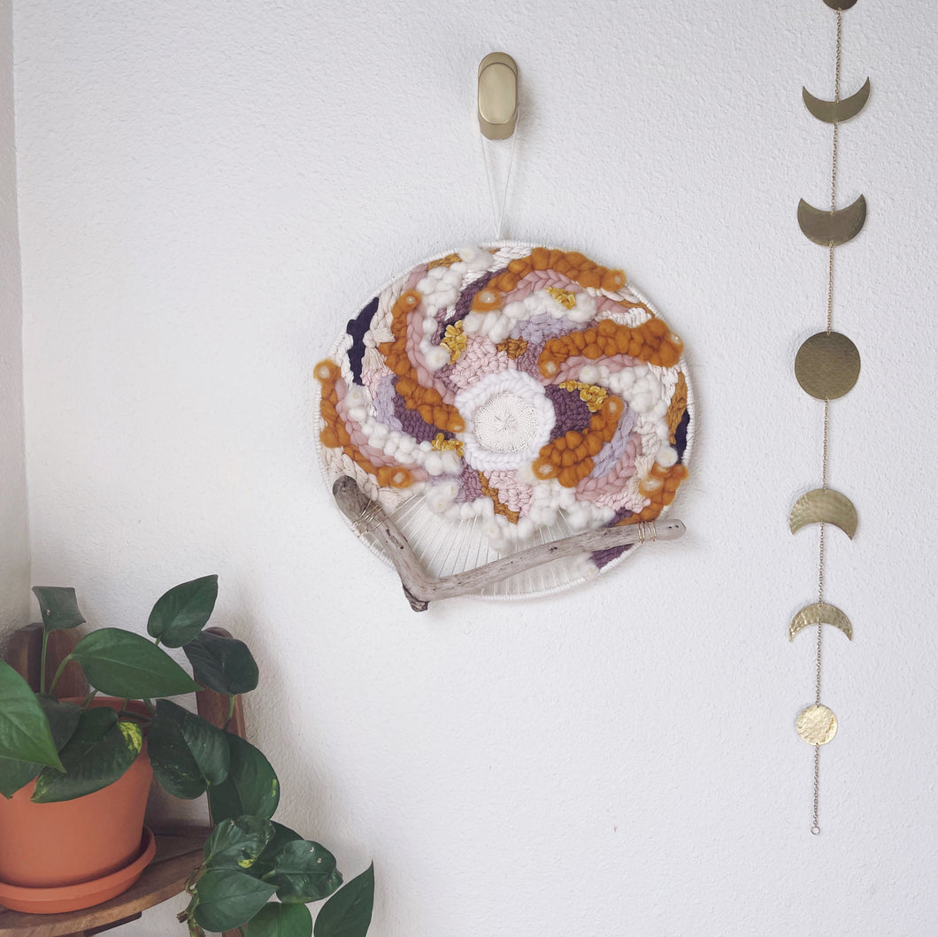 round woven wall hanging, purple, gold, cream, rose, driftwood