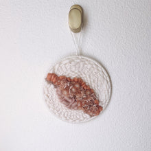 Load image into Gallery viewer, handcrafted round woven wall hanging with peach, coral and dusky rose, sand and cream wool and natural fibers
